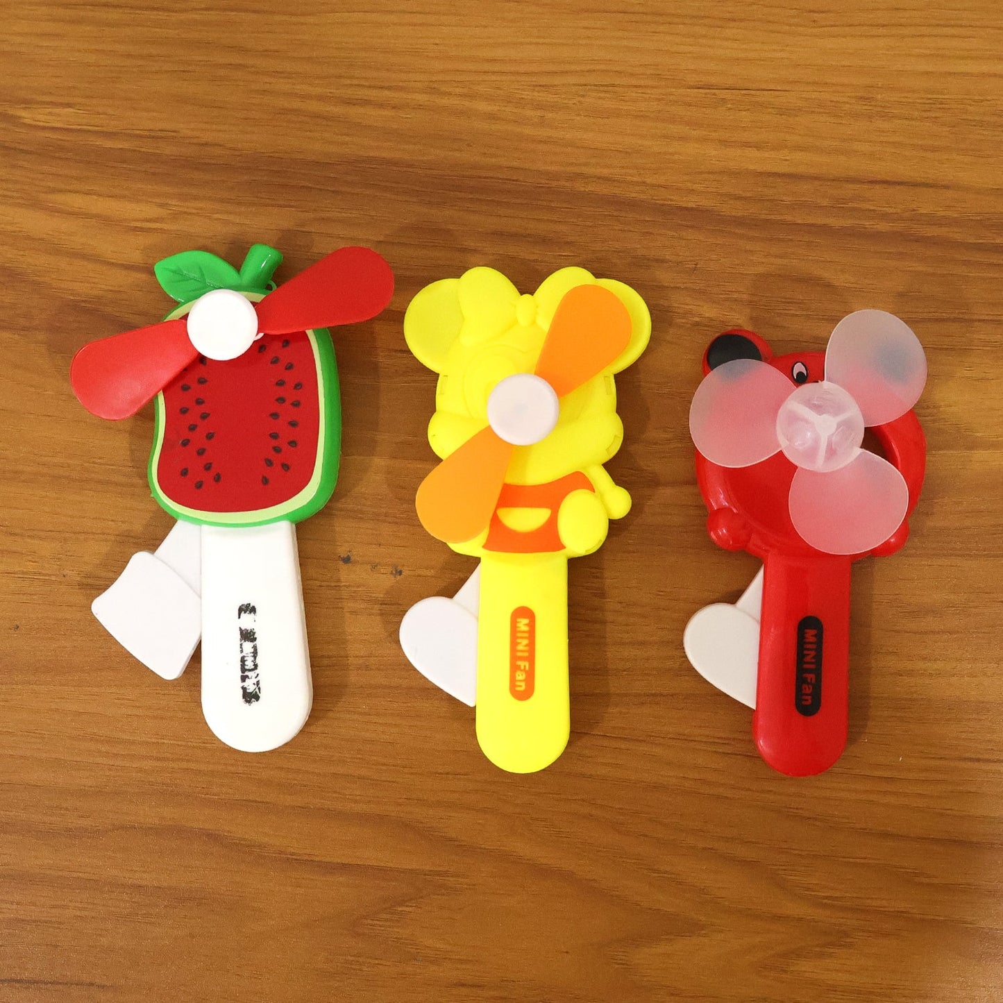 Hand Press Mini Portable Fan Toy (1 Pc, Mix Color & Design)